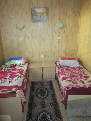 Гостиница Гостевой дом на Речной Кандалакша Односпальная кровать в общем номере-3